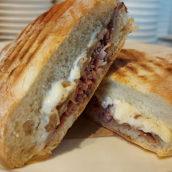 Roast beef and swiss cheese sandwich in a Portuguese bun from take five cafe